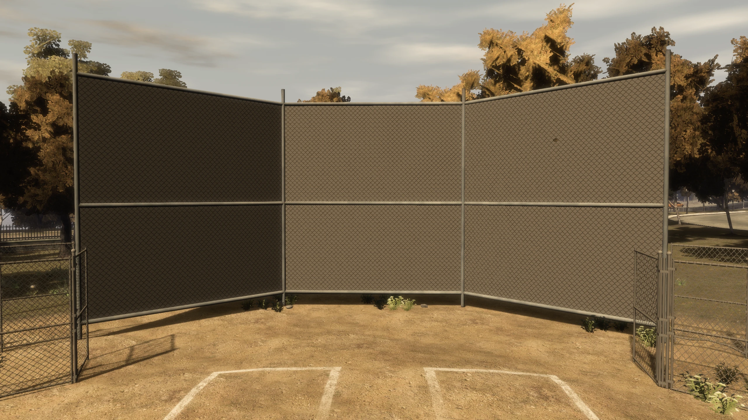 A screenshot of a fence in GTA IV which has broken transparency and you can't see through it.