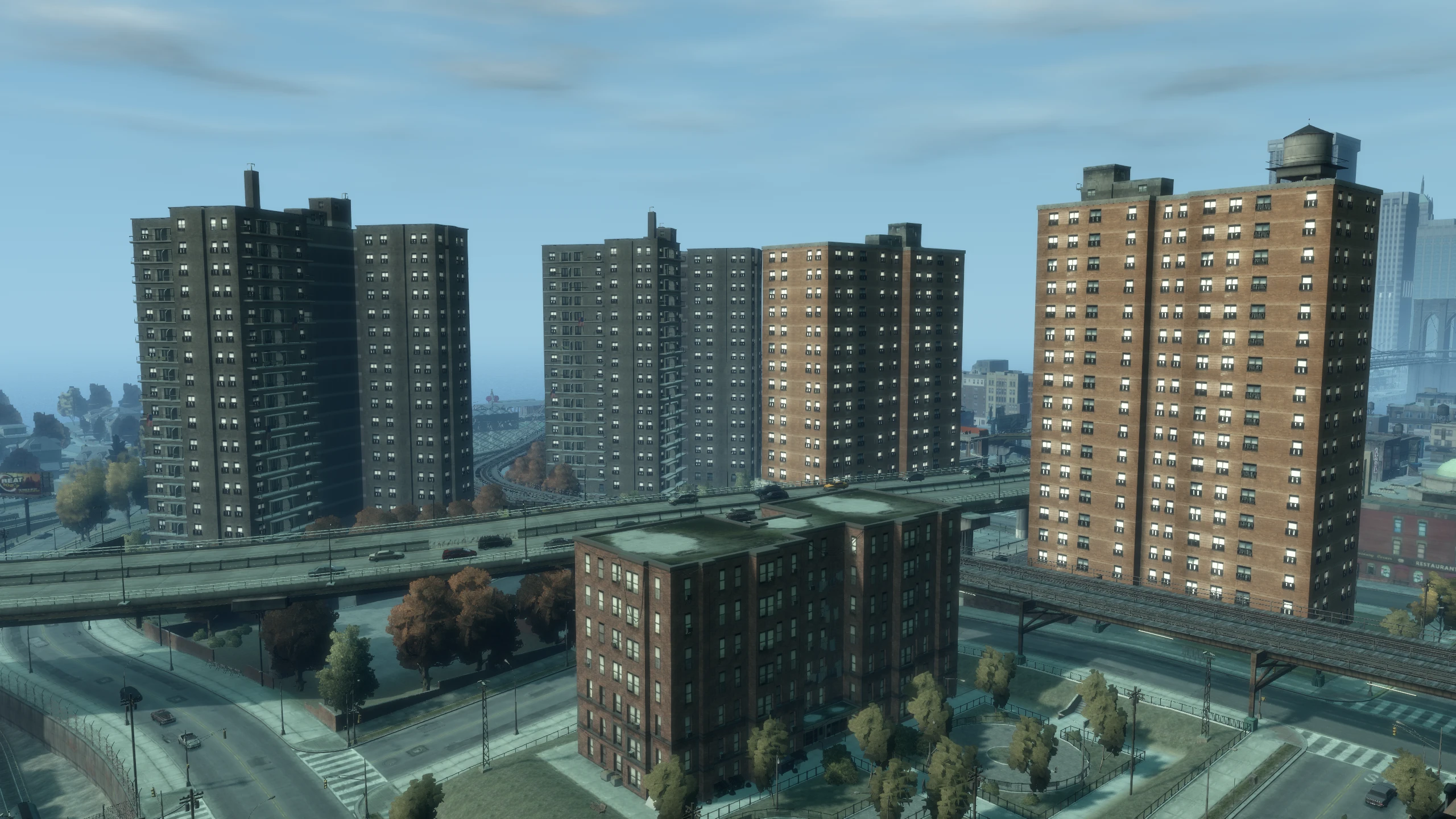 A screenshot of apartment blocks in GTA IV which have windows that are too bright in comparison to all of the other buildings in the game.