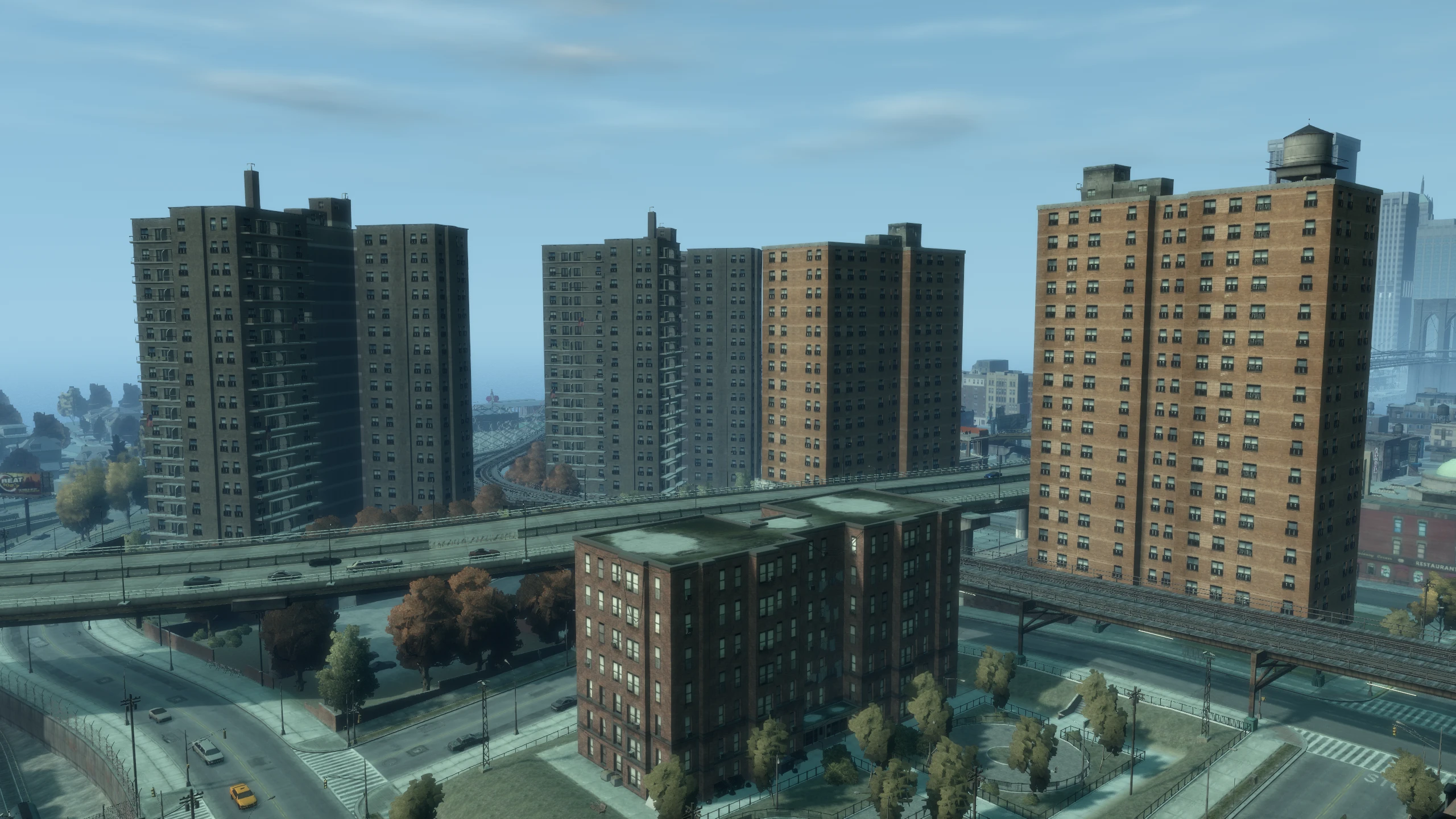 A screenshot of the same apartments in GTA IV but the brightness of the windows has been reduced.